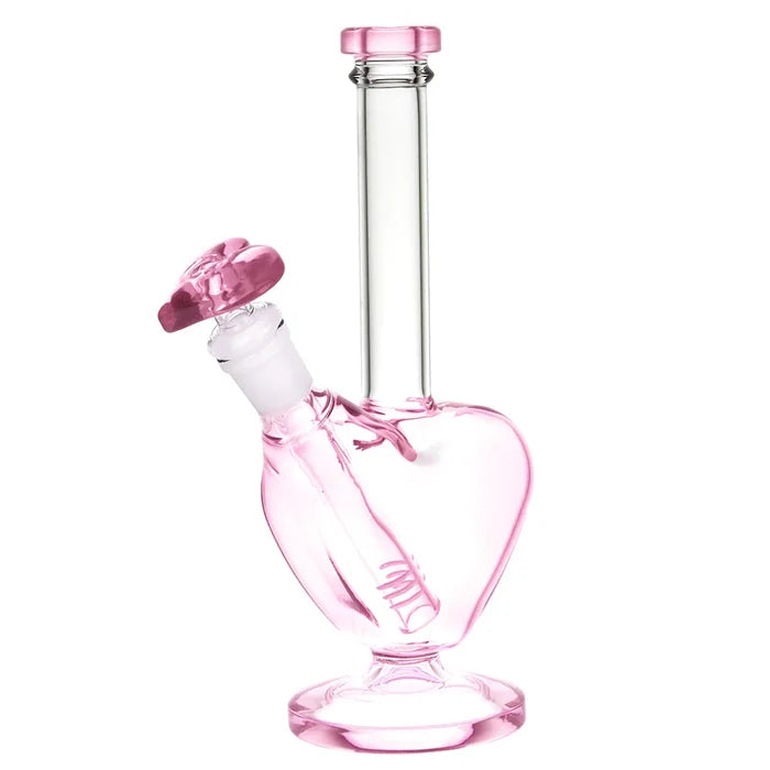 A pink heart-shaped glass bong water pipe with a matching bowl