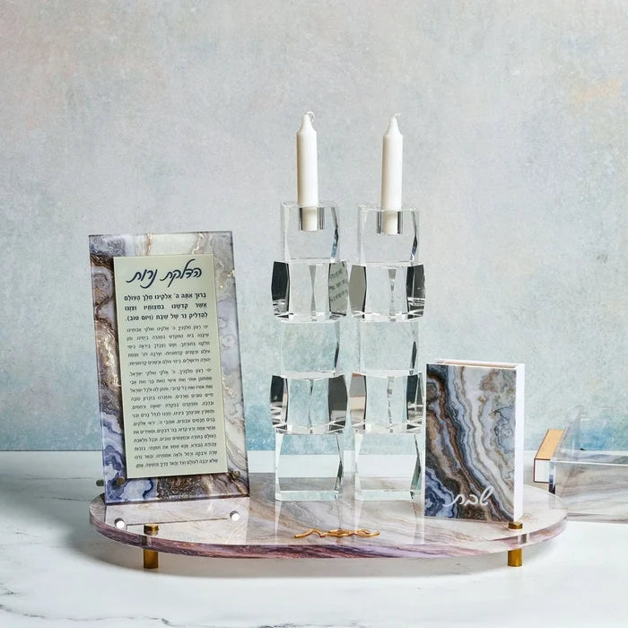 Agate Hadlokas Neiros set featuring white candlesticks with natural stone base and informational cards by Waterdale Collection.