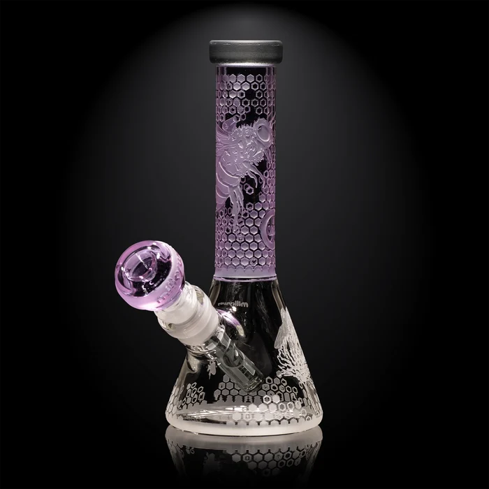 Glass bong with purple accents on a black background