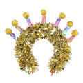 Gold tinsel headband with colorful fabric candles and pom-poms, front view, on a white background.