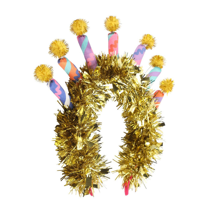 Gold tinsel headband with colorful fabric candles and pom-poms, front angle view, on a white background.