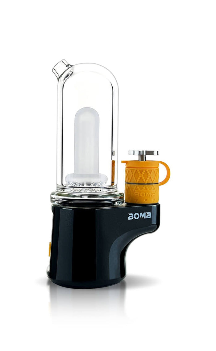 Electric dab rig  with clear glass chamber and black base on a white background