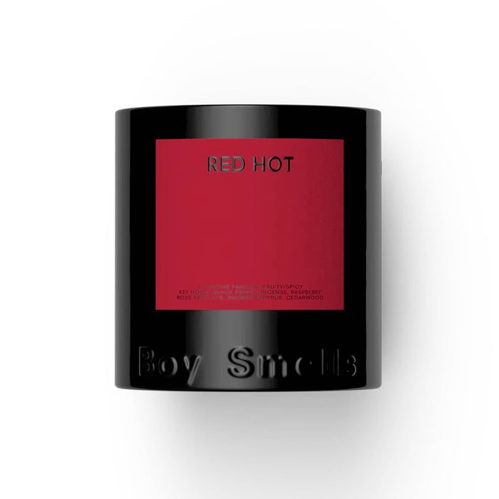 Boy Smells Red Hot scented 9 ounce Classics candle in black glass vessel with dark red label, front view.