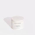 Brooklyn Candle Studio Palo Santo candle in white lidded tin on a white background.
