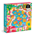 The Valerie Nelson Capybara Pool Day 500 Piece Family Puzzle features cartoon capybaras relaxing in a vibrant pool scene with floaties, umbrellas, and tropical plants—perfect fun for the whole family.