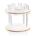 Classic round liquor set with clear glass decanter bottles arranged on two-tier acrylic stand with gold trim accents.