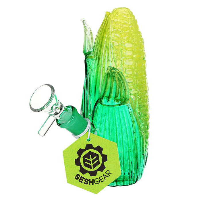 Green Yellow glass corn-shaped water pipe with a 'Sesh Gear' tag on a white background