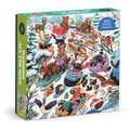 The Lucia Baertl "Dashing All the Way" 500 Piece Puzzle features winter animals—bears, raccoons, foxes, and more—sledding on a snowy hill in a festive scene with trees and snow-covered ground.