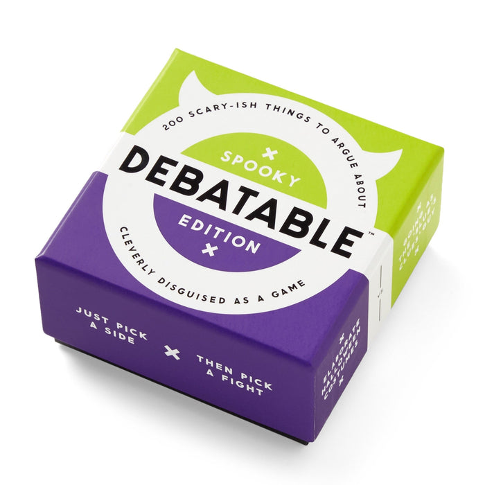 A box of Brass Monkey’s Debatable Spooky Edition, featuring green and purple colors, with the text “200 scary-ish things to argue about” and “Just pick a side, then pick a fight.”.