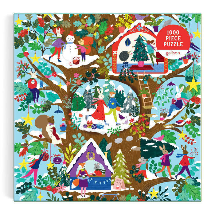 The Deck the Hollows 1000 Piece Puzzle by Flora Waycott features charming animals like rabbits and mice celebrating winter in a decorated tree, surrounded by snow, stars, ornaments, houses, gift-giving, and snowman-building.