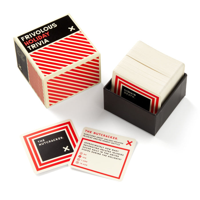 Brass Monkey’s Frivolous Holiday Trivia features a red and white striped box with fanned-out cards showing fun holiday questions and answers—ideal for any Christmas or holiday party game.