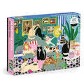 The Anne Bentley Glamour Cats 1000 Piece Puzzle features a vibrant illustrated scene of stylish cats lounging in a chic living room with plants, portraits, and elegant furniture—perfect for cat lovers and puzzle fans alike.
