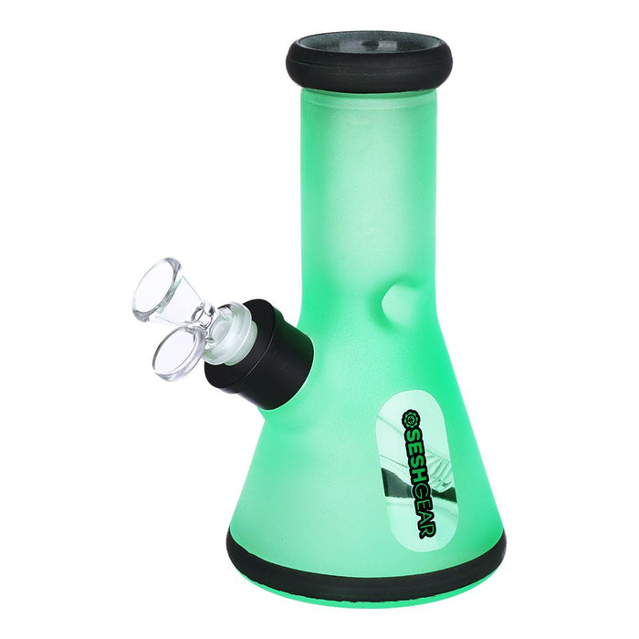 Green smoking device with black accents on a white background