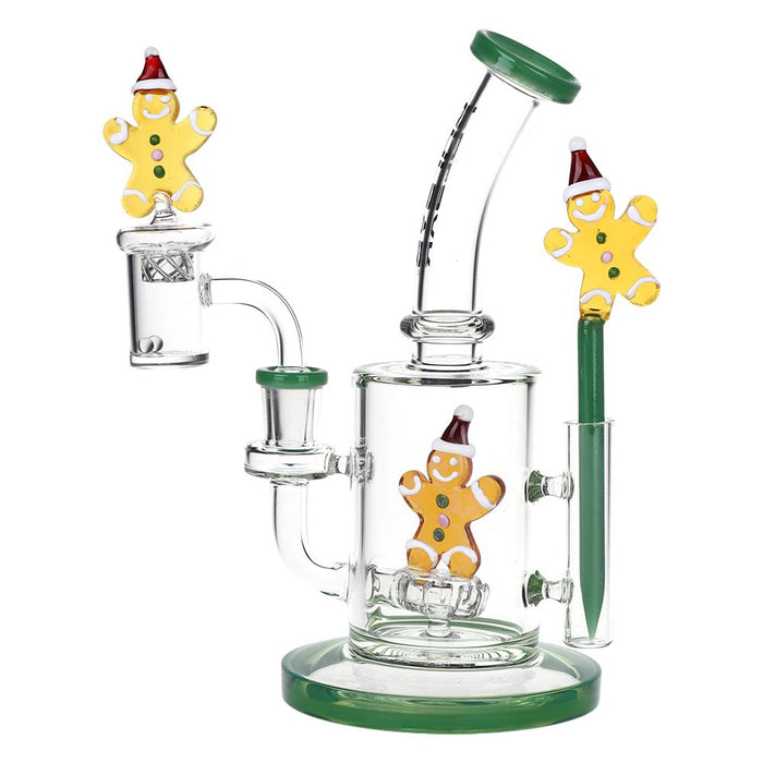 Glass smoking device with gingerbread man decorations on a white background