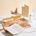 The Leather Booklet Chanukah Set from the Waterdale Collection - the leather brachos booklet with the menorah, painted tray and match holder