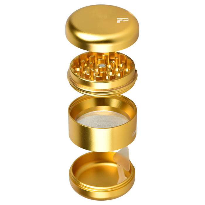 Gold metal grinder with four compartments on a white background