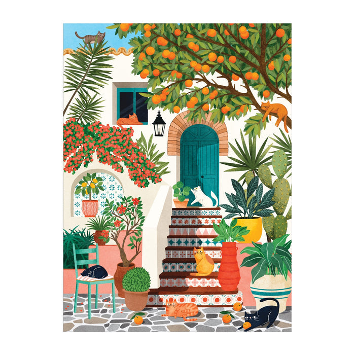 The Mediterranean Cats 1000 Piece Puzzle by Tània Garcia features a vibrant courtyard scene with lush plants, orange trees, potted flowers, stone steps, and six playful cats basking in a sunlit, cozy Mediterranean setting.