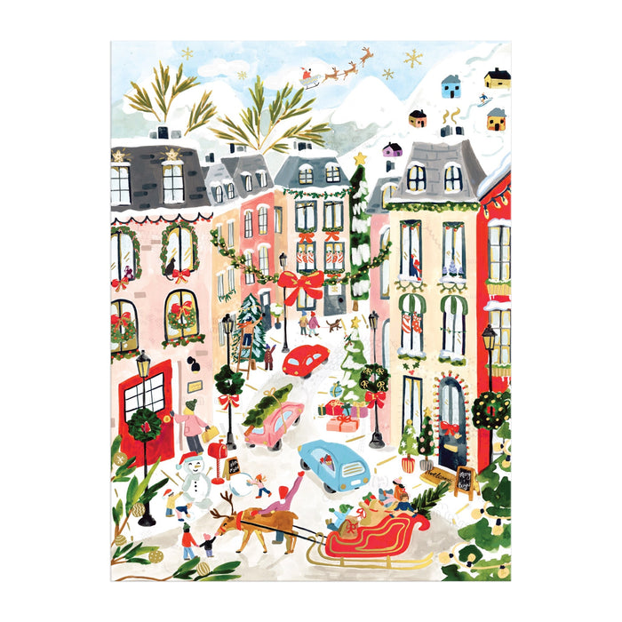The Sabina Fenn Merriest Village 1000 Piece Foil Puzzle features a festive town square with decorated buildings, people ice skating, children building a snowman, snowy streets with cars, Santa’s sleigh overhead, and mountain vistas.