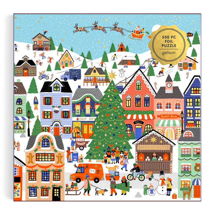 A festive winter village scene by Holly Maguire features colorful houses, people ice skating, gift giving, a big Christmas tree, and Santa flying overhead. "Merryville 500 Piece Foil Puzzle" is displayed in the top right corner.