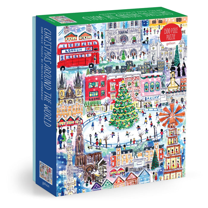 The Michael Storrings Christmas Around the World 1500 Piece Puzzle features a festive city scene with a tree, skaters, buildings, bakery, red double-decker bus, and snow. Box reads "Christmas Around the World.