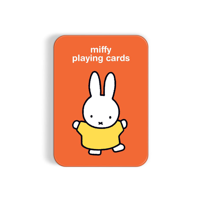 The Miffy Playing Card Deck by Miffy comes in a rectangular orange tin featuring “miffy playing cards” text and an illustration of a white bunny in a yellow dress.