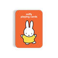 The Miffy Playing Card Deck by Miffy comes in a rectangular orange tin featuring “miffy playing cards” text and an illustration of a white bunny in a yellow dress.