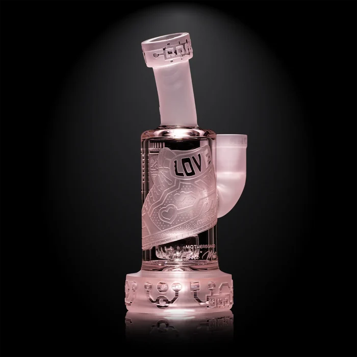 Pink Clear glass water pipe with engraved design on a black background