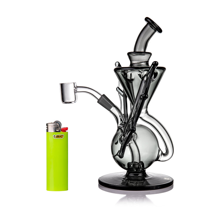 Glass dab rig next to lighter by MJ arsenal