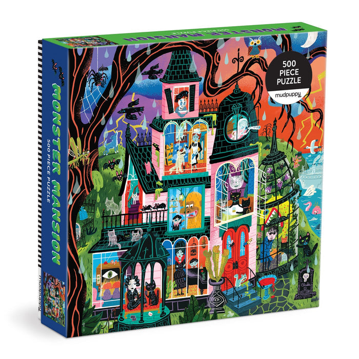 The Stephanie Birdsong Monster Mansion 500 Piece Puzzle comes in a colorful box showcasing a spooky, cartoon-style mansion filled with quirky monsters and Halloween-themed details. This family-friendly puzzle is perfect for those seeking a fun and festive Halloween activity to enjoy together.