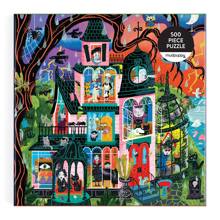 Set the scene for spooky fun with the Monster Mansion 500 Piece Puzzle by Stephanie Birdsong. This colorful illustration features a pink Victorian house filled with ghosts, black cats, skeletons, and witches. Dark branches frame a vibrant night sky illuminated by a glowing moon and twinkling stars in the background. Perfect for all ages, this family puzzle comes beautifully boxed and ready to delight!.