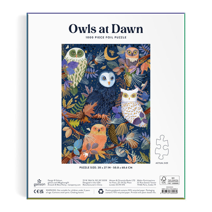 The Mara Penny Owls at Dawn 1000 Piece Foil Puzzle features a vibrant illustration of five owls among leaves and branches set against a dark, starry backdrop.