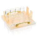 Cream resin liquor and wine serving set with multiple glasses and matching bottle holder on white base, by Waterdale Collection