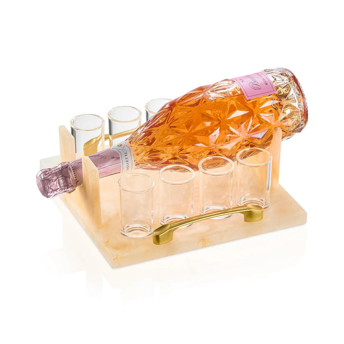 Resin liquor serving set with pineapple-shaped amber bottle and four small glasses on wooden base, perfect for Shabbat or hostess entertaining.