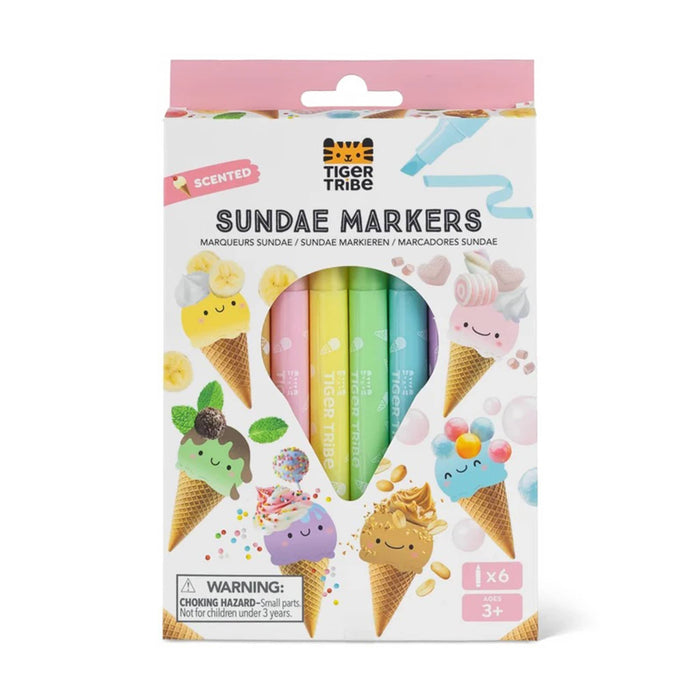 Tiger Tribe Scented Sundae Markers in a retail package, featuring pastel-colored markers visible through a die-cut ice cream cone shaped window on the front of the box. Shown on a plain white background.
