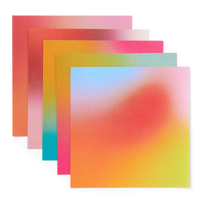 Five square sheets with soft, colorful gradients are overlapped on a white background—perfect for your next Shrimpin Aint Easy Origami Kit by Brass Monkey.