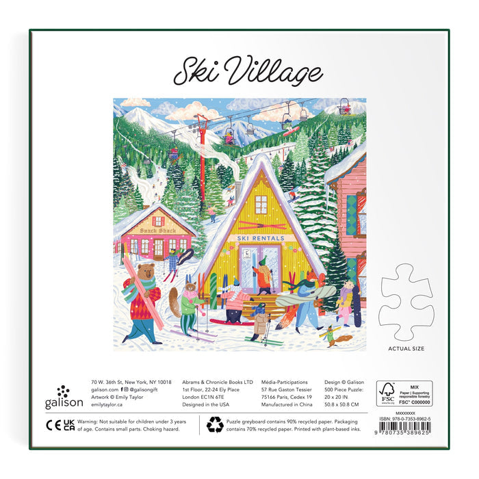 Emily Taylor's Ski Village 500 Piece Puzzle features a lively winter scene with people in ski gear near a yellow Ski Rentals cabin, set among snow, pine trees, and mountains.