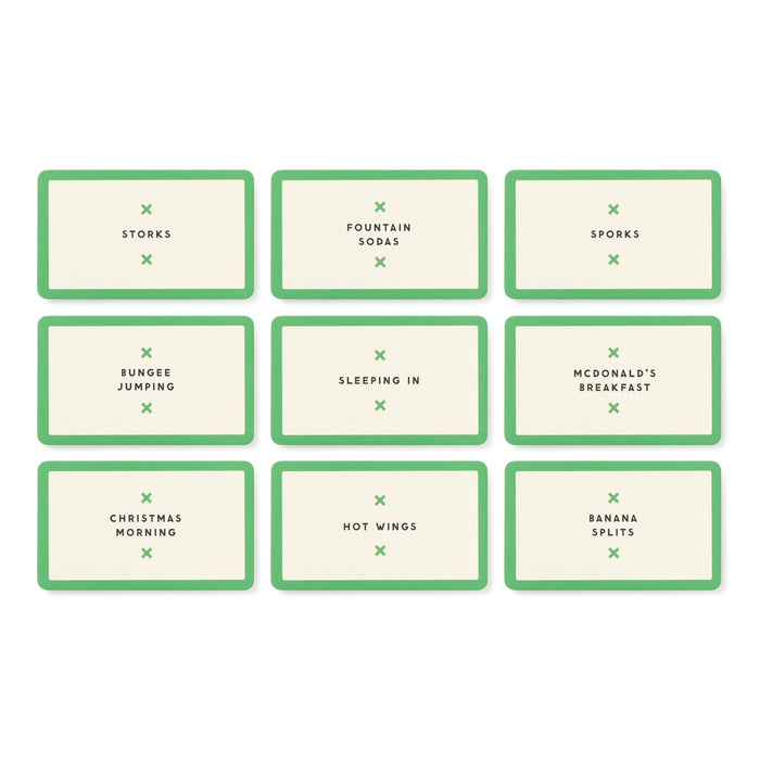 Nine rectangular cards with green borders display words like STORKS, FOUNTAIN SODAS, and BANANA SPLITS, inviting players to spark fun debates in Spork Versus Stork Social Game by Brass Monkey.