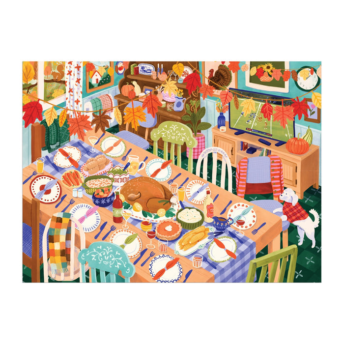 The Thankful Table 1000 Piece Puzzle by Carla Ellis features a cozy Thanksgiving dining room scene with a turkey, side dishes, autumn décor, colorful plates, scarves on chairs, fall leaves, and a dog near the table.