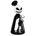 A novelty glass water pipe shaped like a stylized character with a white skull head, black hair, and a black body, holding a clear glass bowl. The product is shown on a solid white background.