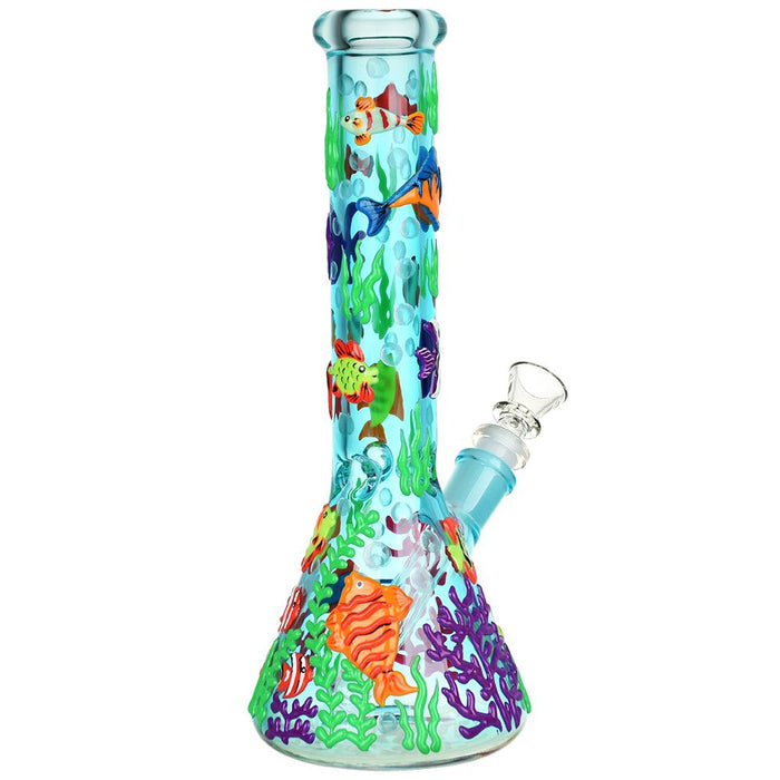 Colorful glass water pipe with fish and coral reef design on a white background