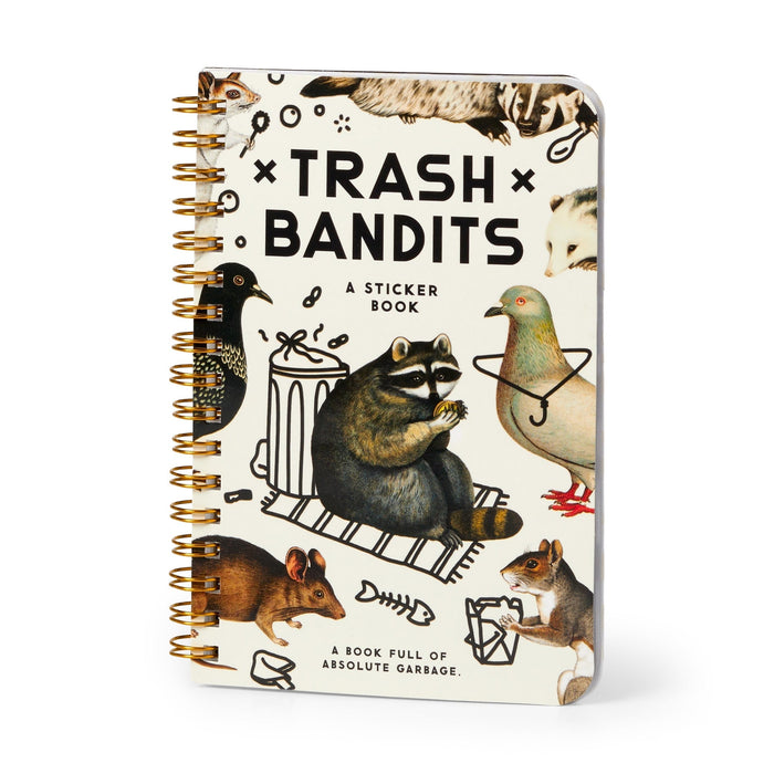 The Brass Monkey Trash Bandits Sticker Book is spiral-bound and filled with puffy stickers, featuring playful illustrations of a raccoon, pigeon, opossum, and more trash animals. Tagline: "A book full of absolute garbage.