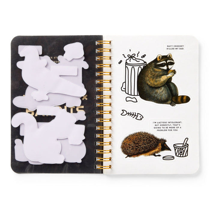 The Brass Monkey Trash Bandits Sticker Book features trash animal stickers on the left and fun illustrations of a raccoon eating and a hedgehog with a yogurt cup—complete with humorous speech bubbles.