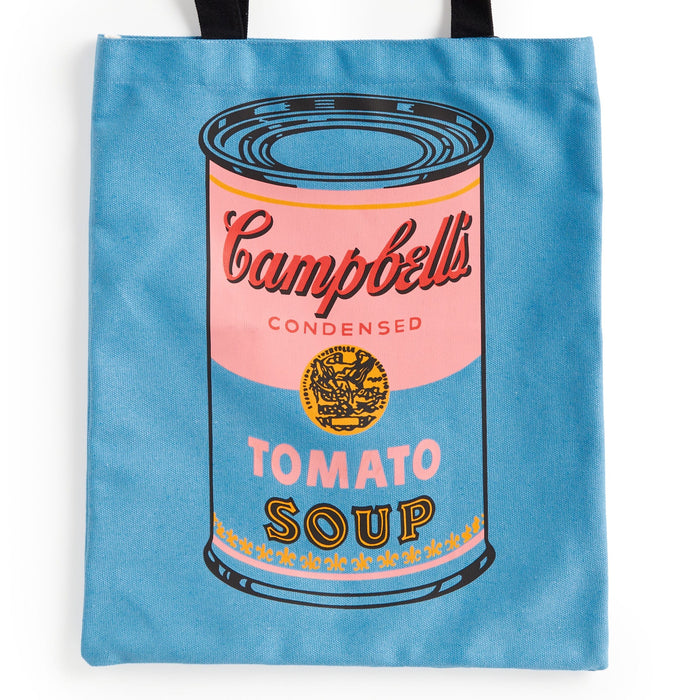 The Andy Warhol Foundation For The Visual Arts' Warhol Soup Can Volume 3 Canvas Tote Bag features a blue design with a large, colorful Campbell’s tomato soup can graphic and black handles.