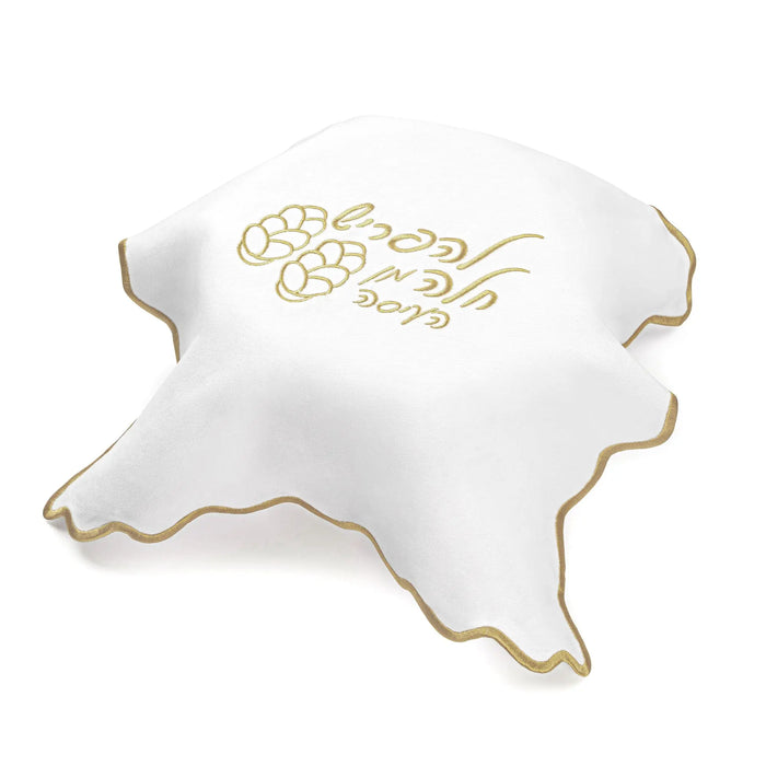 White leather challah cover with gold wavy edges and embroidered hop design, perfect for Shabbat table.