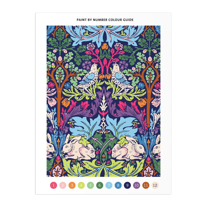 The William Morris Brother Rabbit 9 x 12" Paint by Number Kit features an intricate floral design with two birds, two rabbits, and various leaves and flowers. Numbered color circles are displayed along the bottom for easy painting.