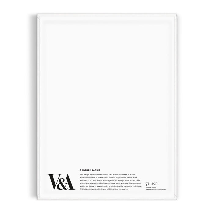 Back of a white rectangular William Morris Brother Rabbit 9 x 12" Paint by Number Kit, with product info and brand logo printed in black at the bottom left corner; the remaining space is blank.
