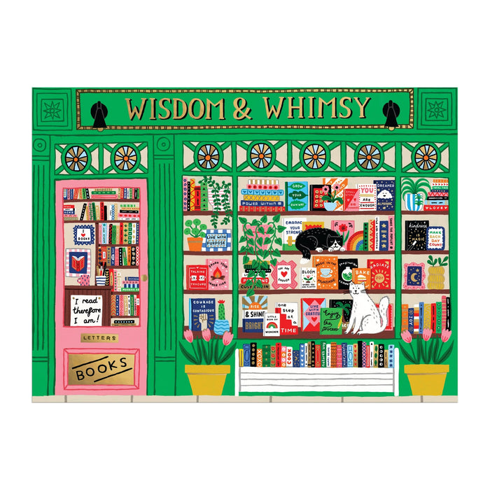 Colorful illustration of Wisdom & Whimsy Bookshop by Holly Maguire: a green storefront with lively bookshelves, two cats, potted plants, and a sign reading “I need therapy & a cat.” Featured on a 1000 piece foil puzzle.