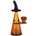 Amber glass Bubbler device with black pumpkin face design on a white background