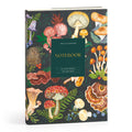 The Olga Akbarova World of Mushrooms Premium A5 Notebook is a hardcover journal with a dark background, vibrant mushroom and plant illustrations, layflat binding, and 200 lined pages.
