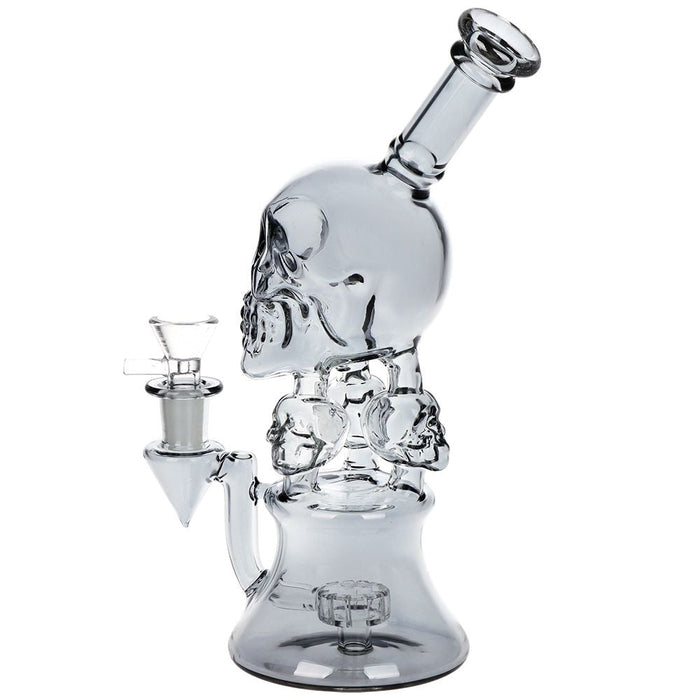 Clear electroplated glass water pipe with skull design on a white background